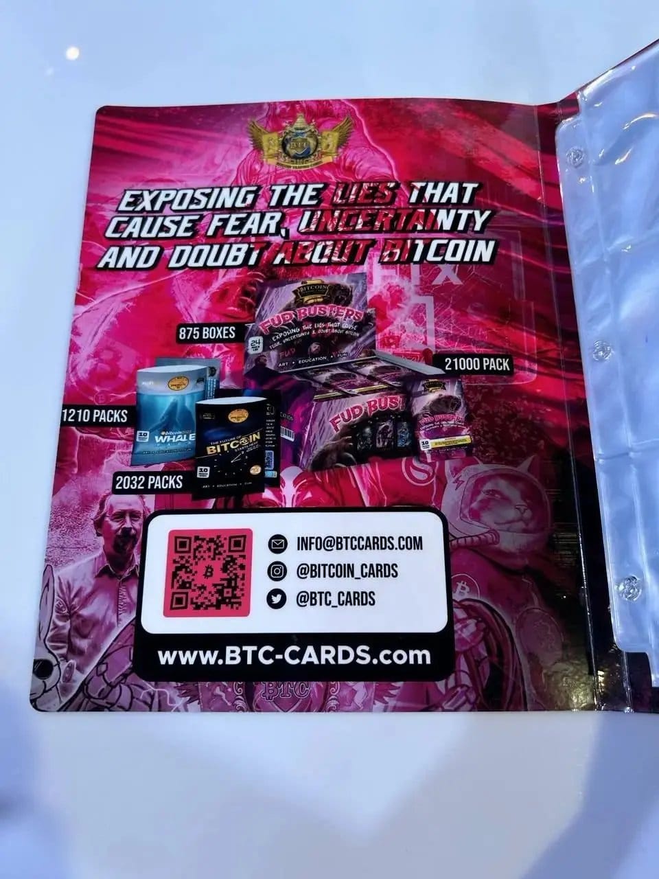 Close-up of the inside left cover of the Bitcoin Trading Cards Series 2 binder, featuring the text 'Exposing the Lies', product production statistics, and social media links.