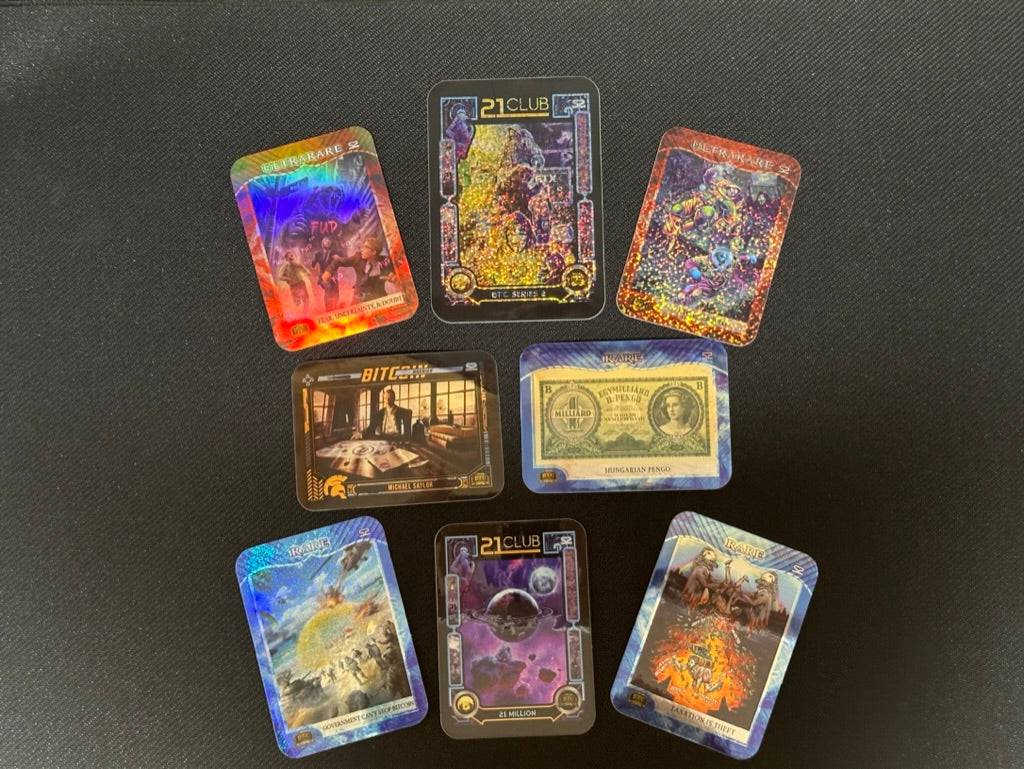 Collection of 8 limited edition stickers from the 'FUD Busters' pack, including a 'Michael Saylor' card sticker, 'Hungarian Pengo' banknote sticker, 'Taxation is Theft' art, 'Government Can't Stop Bitcoin' art, '21 Club' holographic designs, and 'Ultra Rare' FUD monster stickers.