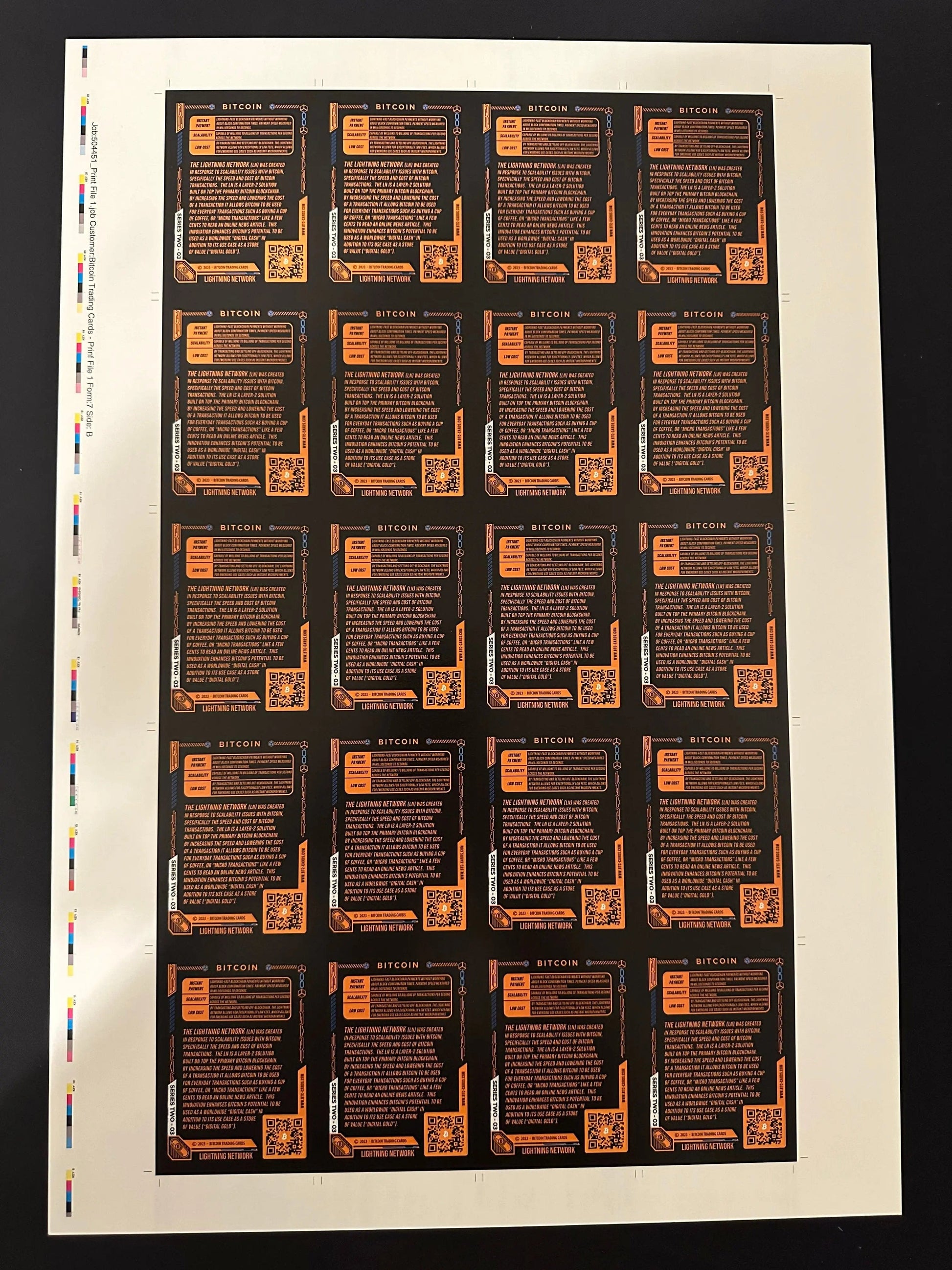 Back of an uncut production press sheet for Bitcoin Trading Cards displaying the text side of 'Lightning Network' cards with printer color bars and crop marks.