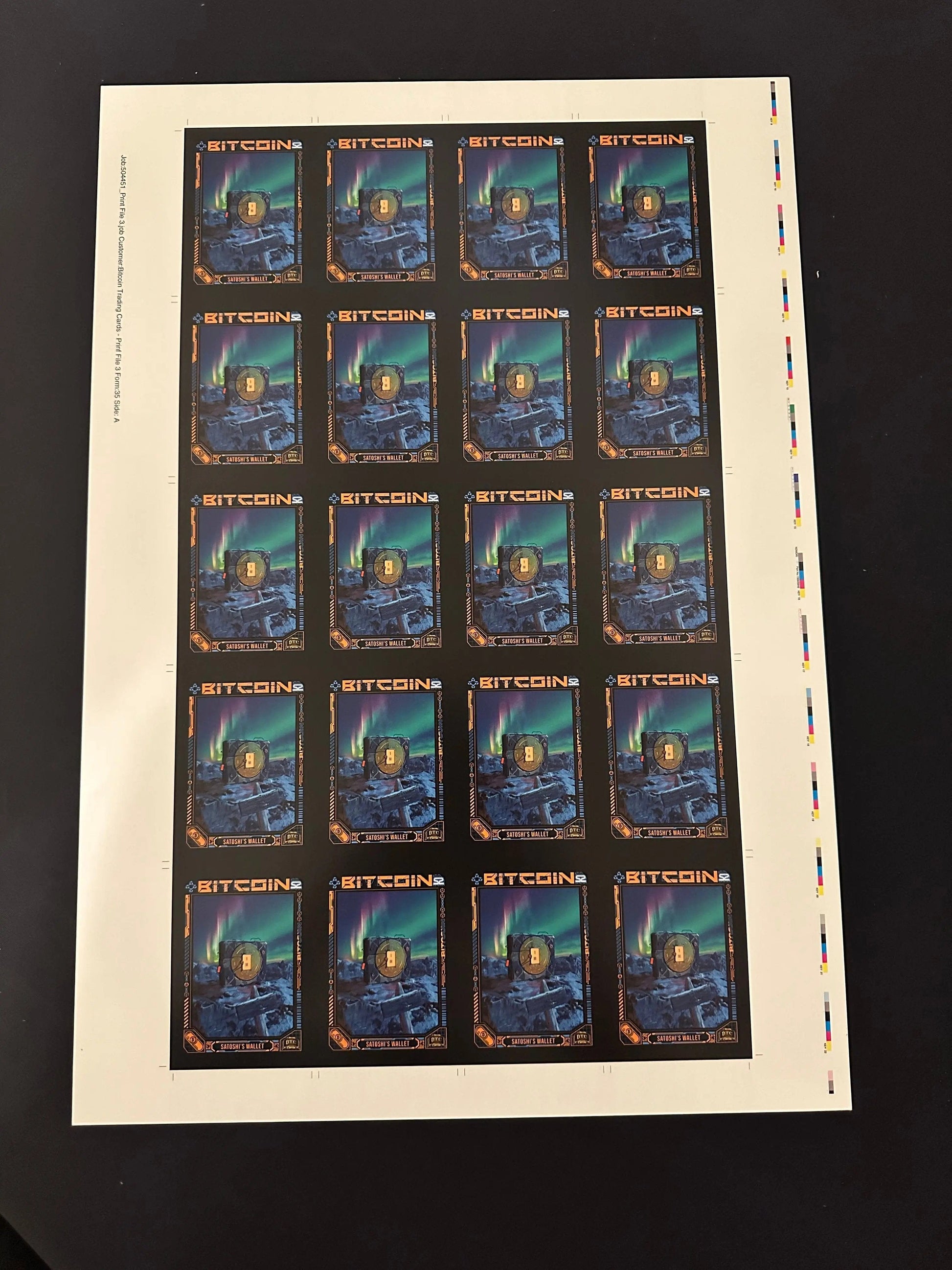 Full uncut production press sheet for Bitcoin Trading Cards displaying the 'Satoshi's Wallet' card grid with visible printer color calibration bars, crop marks, and job details.